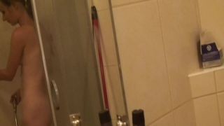 Amateur girlfriend fingers herself while taking a shower